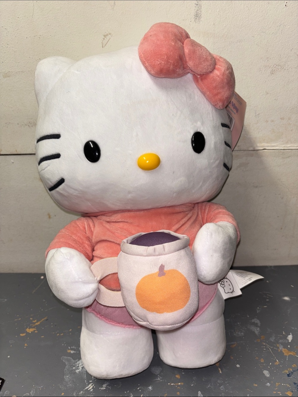 Sanrio Hello Kitty Plush in Pink Outfit with Pumpkin Mug